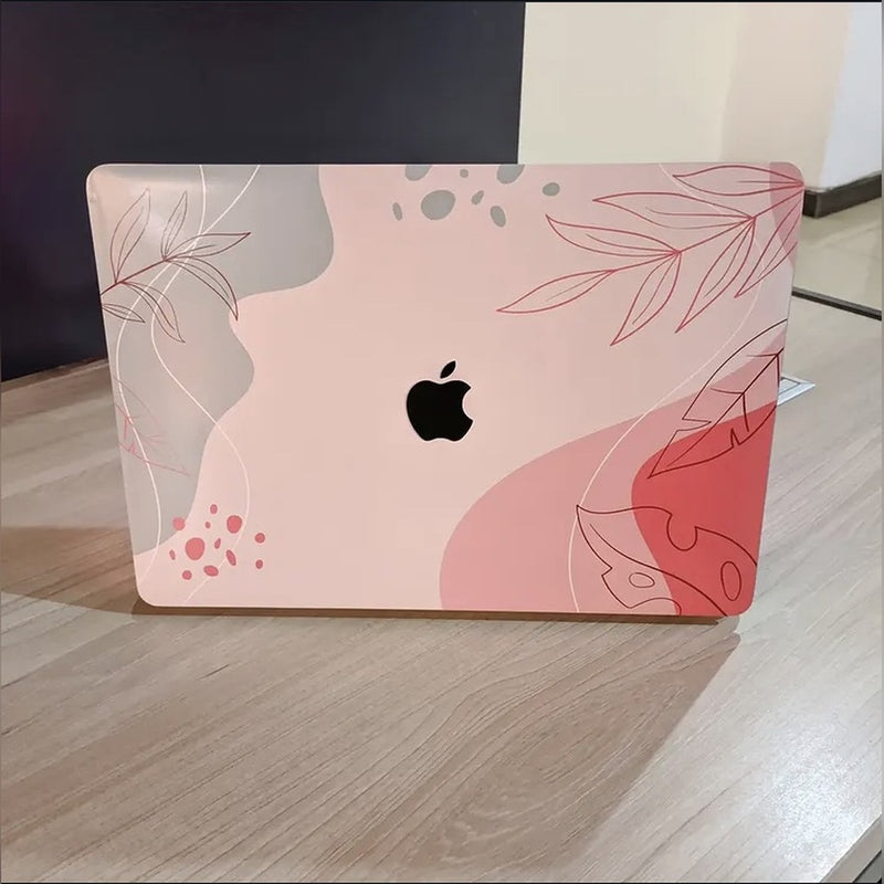 Blush Botanical laptop skin on a MacBook lid