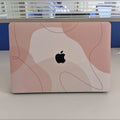 Blush Contour laptop skin on a MacBook lid