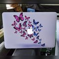 Butterfly Flight laptop skin on a MacBook lid