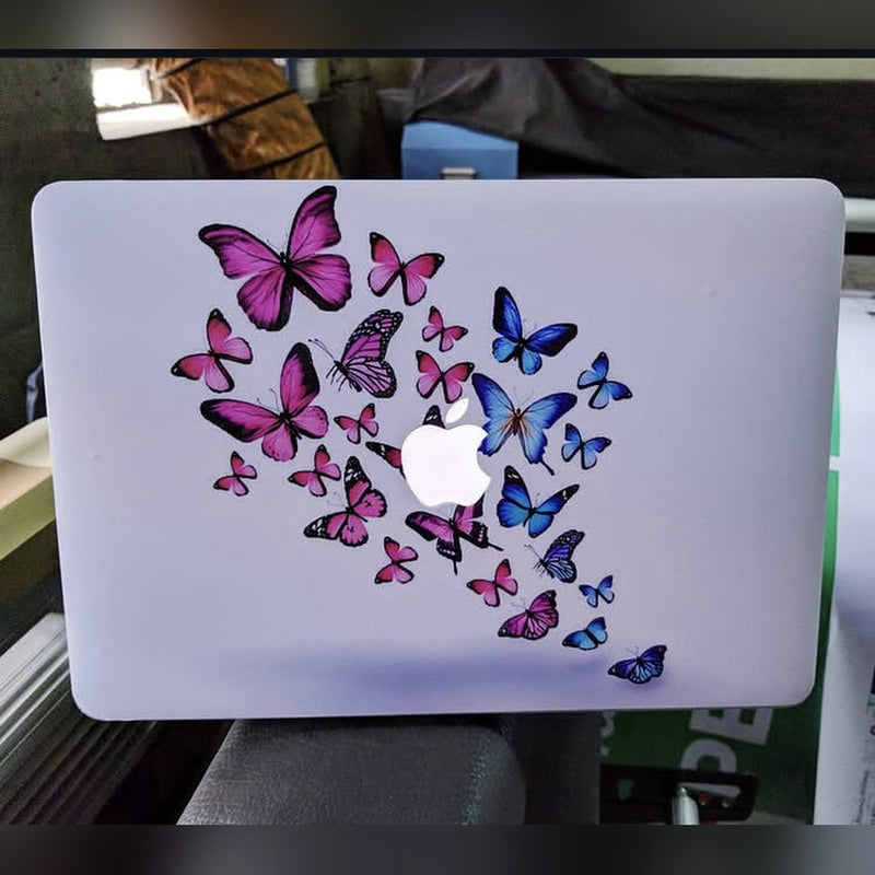 Butterfly Flight laptop skin on a MacBook lid