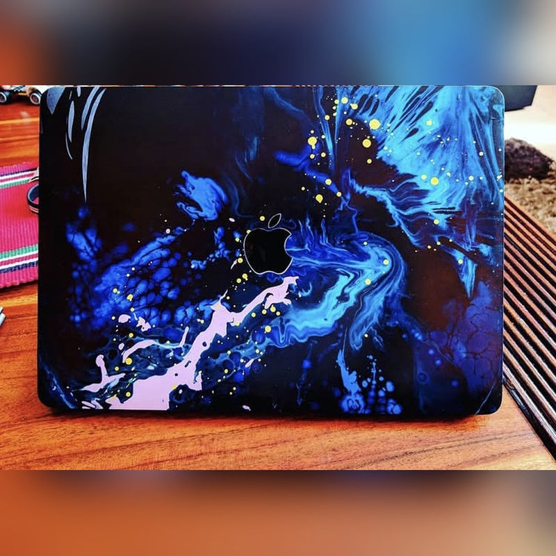 Deep Blue Fluid laptop skin on a MacBook lid