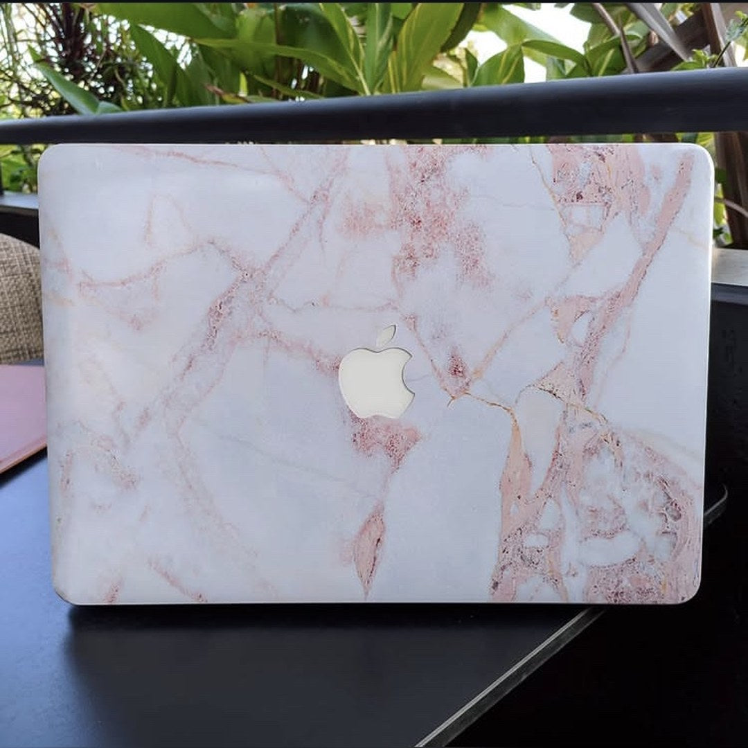 Rose Vein Marble laptop skin on a MacBook lid