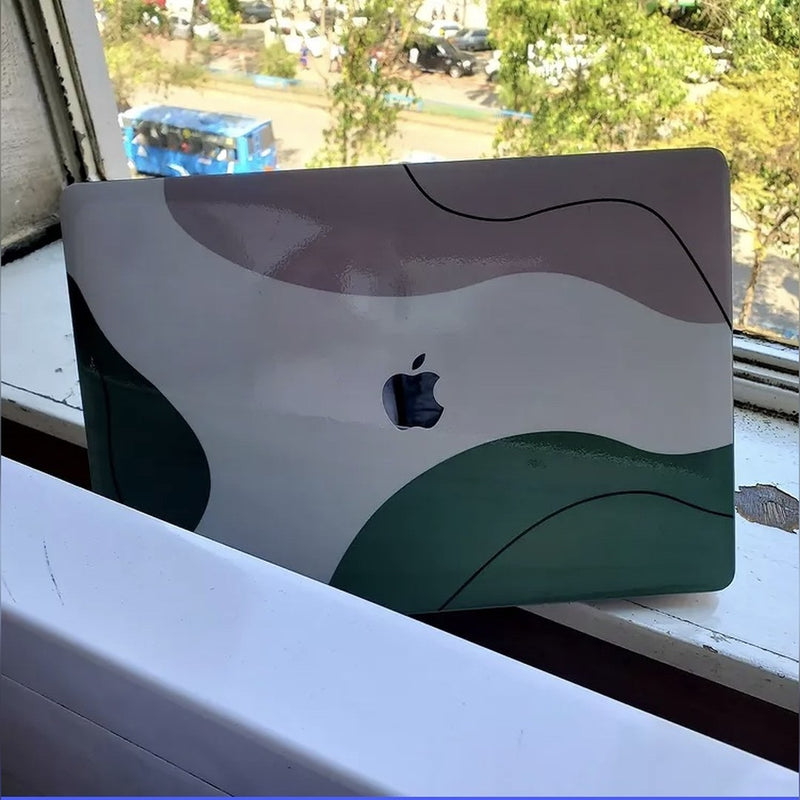 Sage Contour laptop skin on a MacBook lid