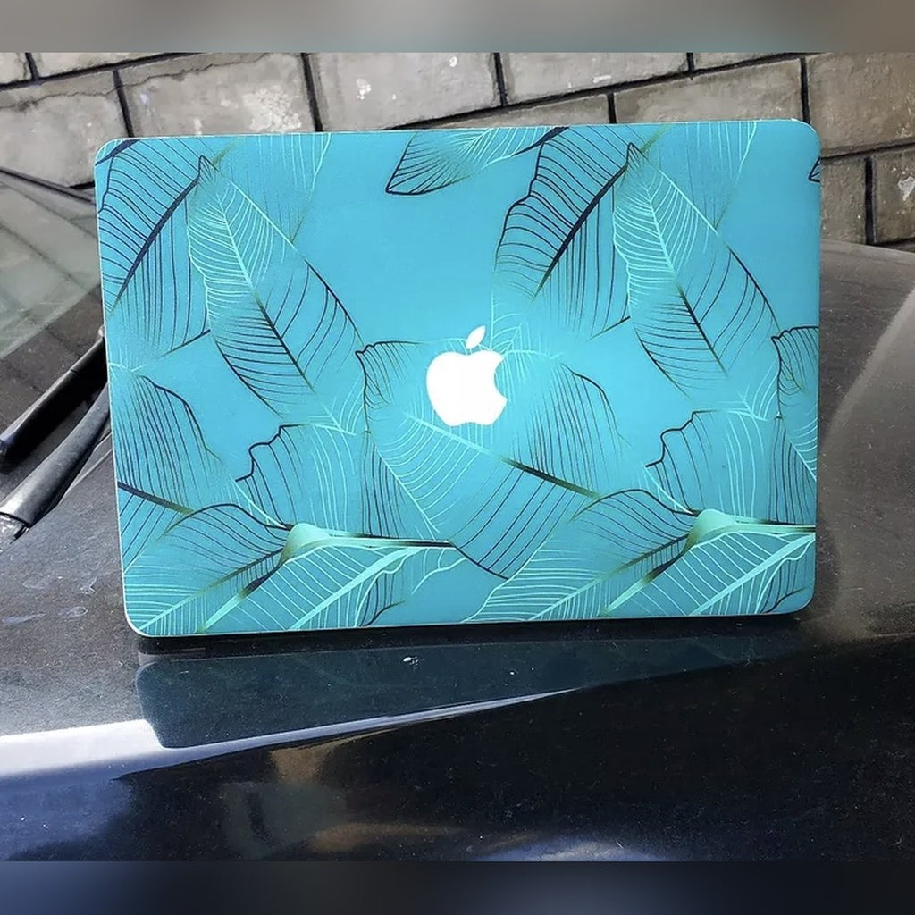 Teal Palm laptop skin on a MacBook lid