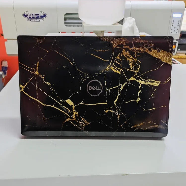 Black Gold Marble laptop skin on a Dell lid