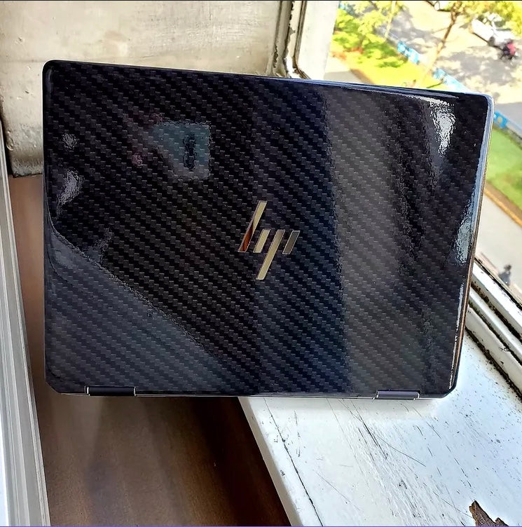 Blue Carbon laptop skin on an HP lid