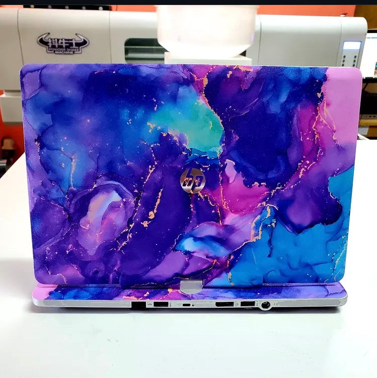 Violet Ink laptop skin on an HP lid