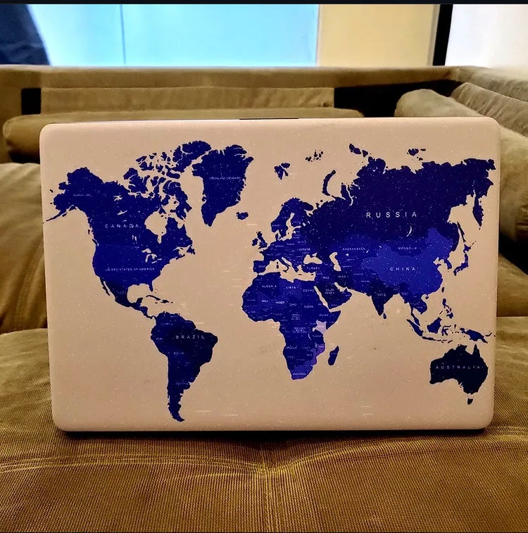 World Map laptop skin on an HP lid