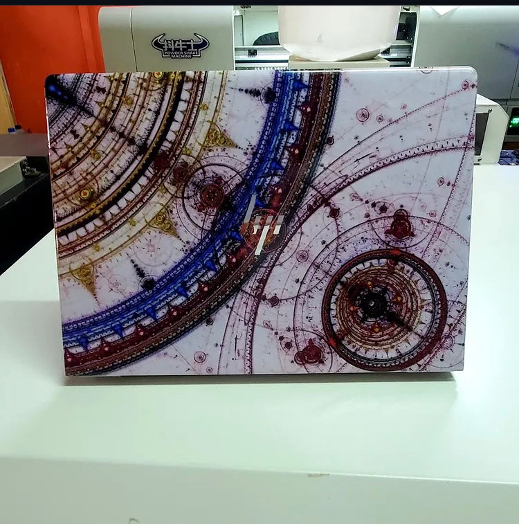 Celestial Compass laptop skin on an HP lid