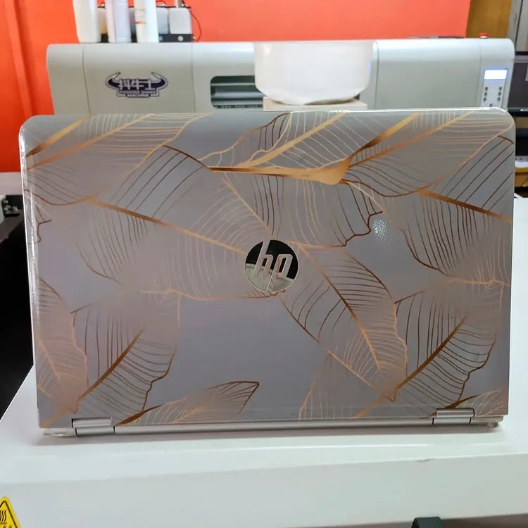 Gold Leaf laptop skin on an HP lid