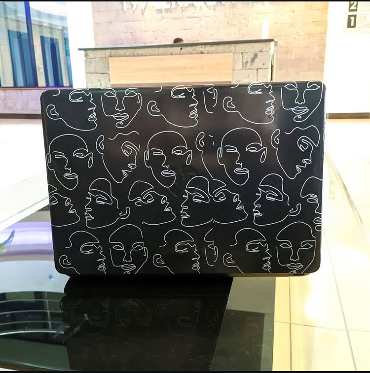 Line Art Faces laptop skin on an HP lid