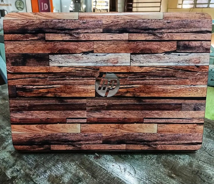 Weathered Planks laptop skin on an HP lid