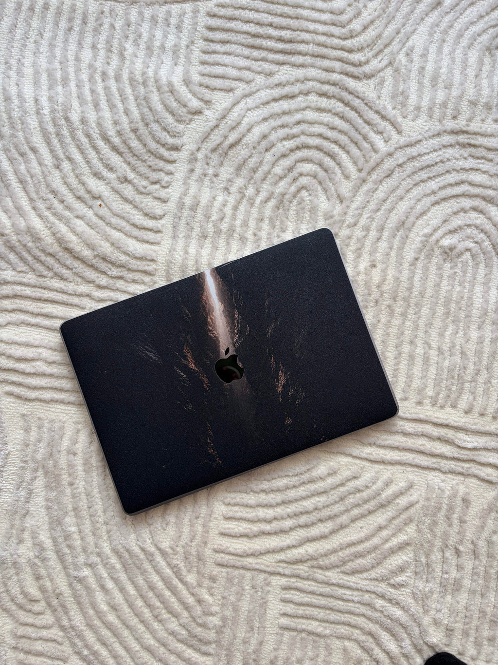 Weight laptop skin — MacBook lid